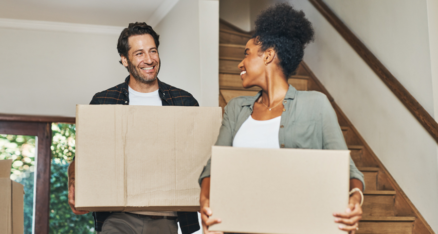 A couple moving into their first home.