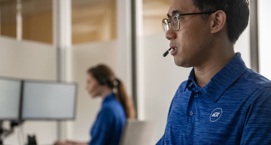 ADT employee in a monitoring center